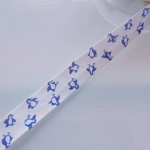 Biais motif enfant - 100% polyester - 2 cm de large - blanc et bleu - vendu au mètre