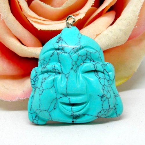 Amulette pendentif représentant tête de bouddha, médaillon turquoise effigie de bouddha,