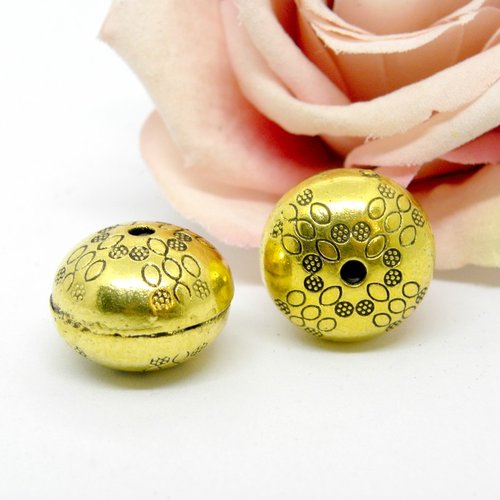 Enorme perle ronde et bouton en métal dorée stylisée, grosse perle ronde en métal couleur dorée,