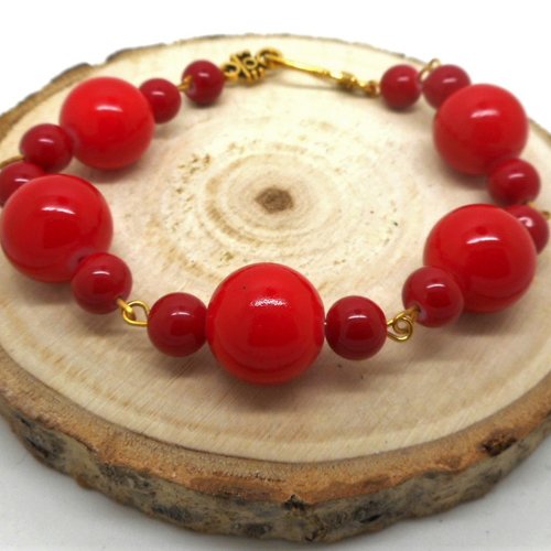 Bracelet perles rouges monture dorée