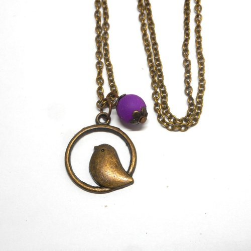 Collier bronze pendentif oiseau et perle violette