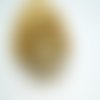 1 pendentif soleil doré 37*35mm avec zircons et perle acrylique blanche (8sbd254)