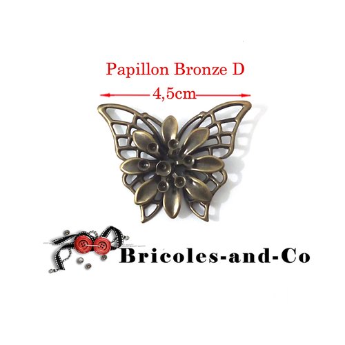 Papillon modèle d, embellissement,  charm ton bronze. largueur 4,5cm