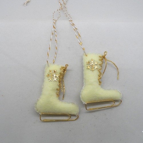 N°62 paire de patins à glace  n°35 écru flocon lacets doré lame blanche ficelle blanc et or