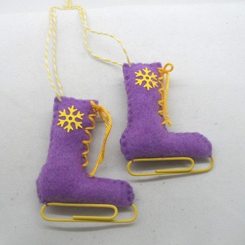 N°62 paire de patins à glace n°7 en feutrine violet lame lacet flocon jaune ficelle jaune et blanche