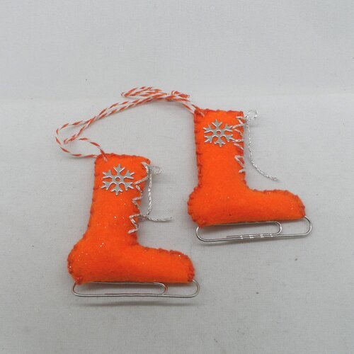 N°62 paire de patins à glace n°26 orange à paillette flocon  lame lacets argenté  ficelle orange et blanche