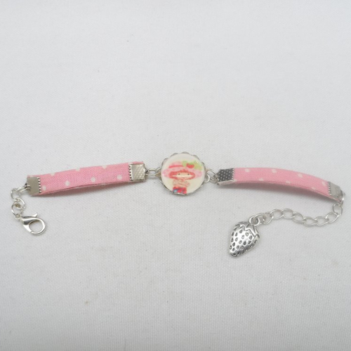 N°80 bracelet enfant cabochon 16 mm  personnage fraise tissu  à pois  blanc fond rose