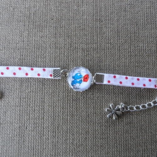 N°80 bracelet enfant cabochon 16 mm  personnage bleu  tissu pois rouge fond blanc 