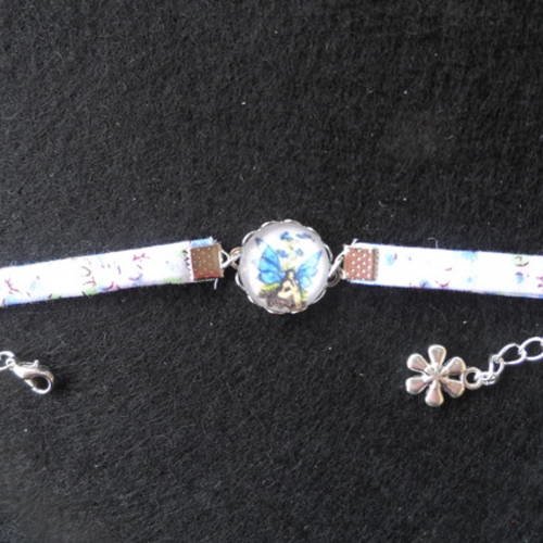 N°80 bracelet enfant cabochon 16 mm fée papillon bleue  tissu fleuri breloque  fleur 