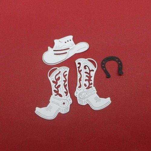 N°877  lot thème cow-boy  comprenant deux bottes un chapeau un fer à cheval   en papier  noir et blanc   découpage fin