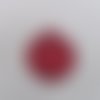 N°909 une grosse boule de noël fait avec un tampon  en papier  rouge    découpage fin