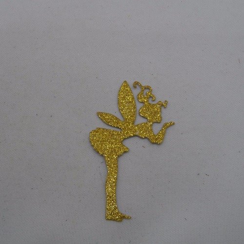 N°583 une petite "fée papillon"  qui envoi un bisou en papier doré à paillettes découpage fin
