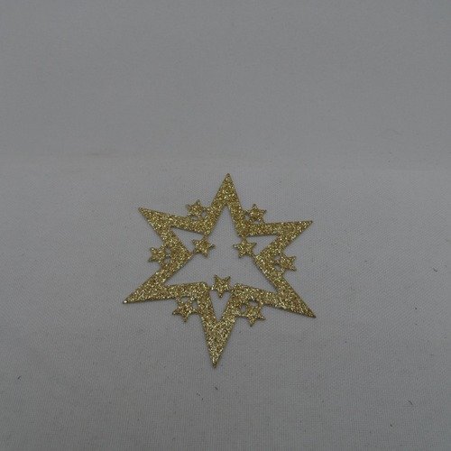 N°882  décoration de noël  étoile en papier  doré pailleté   découpage  fin