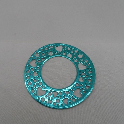 N°963 d'un cercle "couronne" évidé de cœur et de rond  en papier vert turquoise  métallisé découpage fin