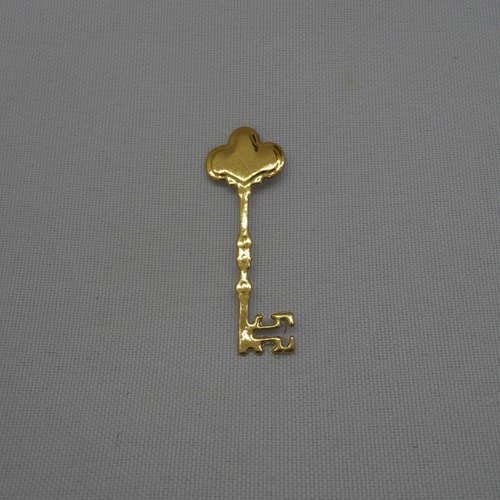 N°1031 petite  clef  en papier doré  découpage fin