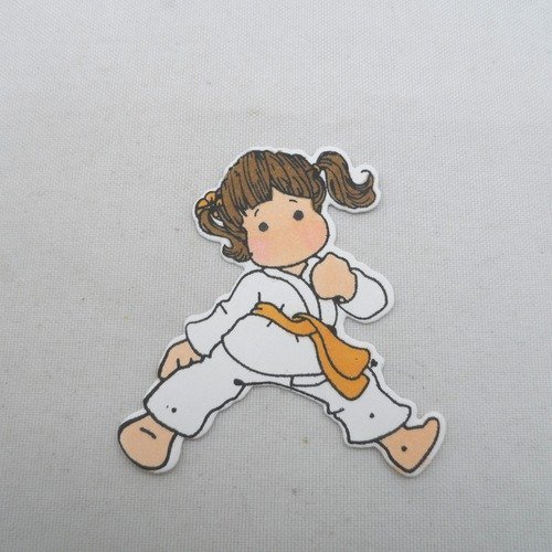 N° 2019 découpe d'une  petite fille judo n°19  avec un tampon encre noir  sur  papier blanc  et colorée