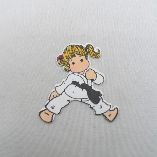 N° 2019 découpe d'une  petite fille judo n°19  avec un tampon encre noir  sur  papier blanc  et colorée