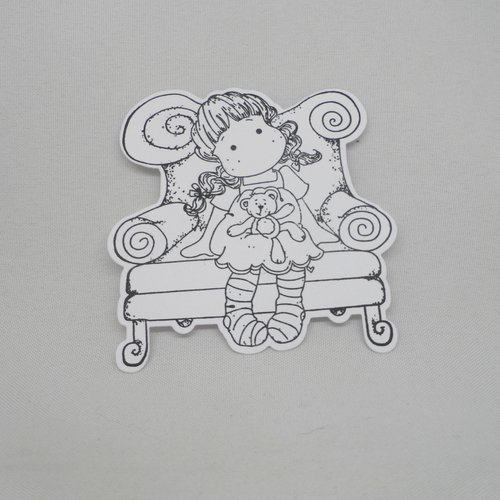 N° 2040 découpe d'une  petite fille assise sur fauteuil  n°24  avec un tampon encre noir  sur  papier blanc