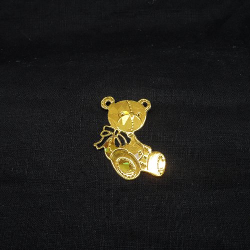 N°665 adorable petit ourson   en papier doré avec hologramme   découpage fin et gaufrage