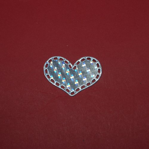 N°1034  jolie  cœur   en papier argenté a métallisé hologramme    découpage fin