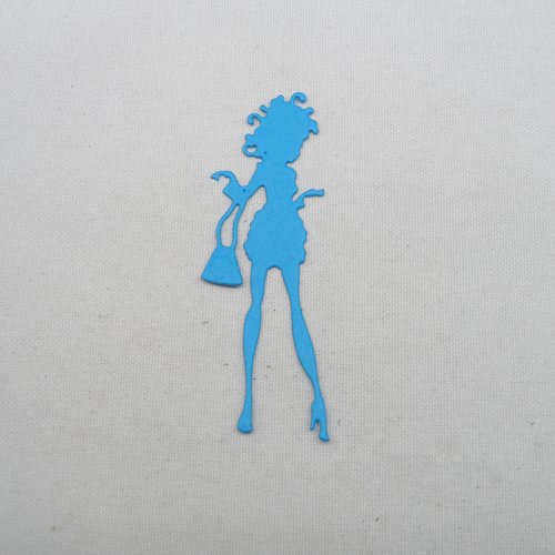 N°1250  une femme avec son sac à main   en papier bleu turquoise découpage fin