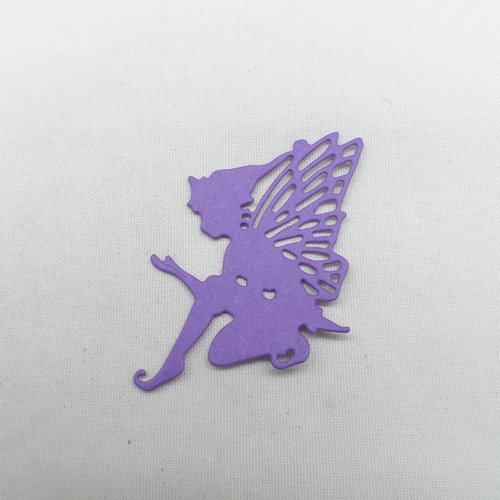 N°1323 un "lutin  papillon" n°1  assis  en papier violet  découpage fin