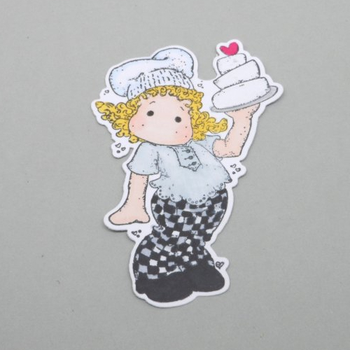 N° 2058 découpe d'une  petite fille  cuisinière gâteau  n°31 colorée avec un tampon encre noir  sur  papier blanc