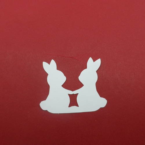 N°857  petit couple de lapin face à face  en papier blanc  découpage