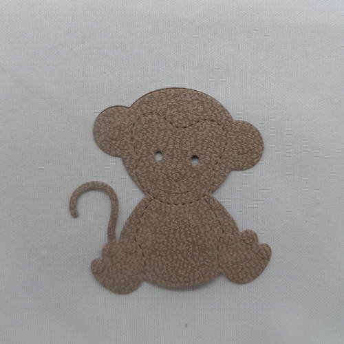 N°758 petit singe en  papier tapisserie marron clair  découpage et gaufrage 