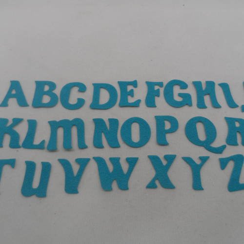 N°626 lettre tout alphabet de a à z  vendu à la lettre  en papier tapisserie bleu turquoise  découpage