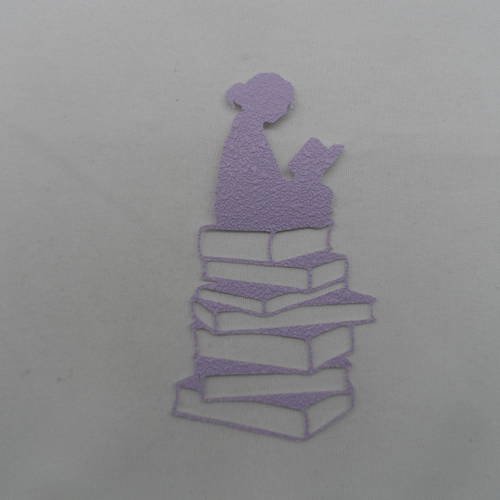 N°764  fille assise sur une pile de livres  en papier tapisserie violet  embellissement