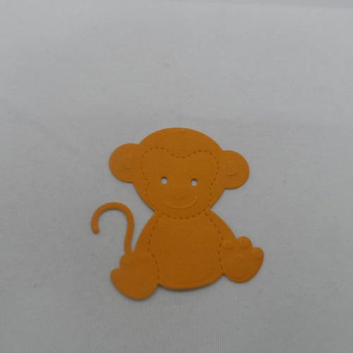 N°758 petit singe  en  papier tapisserie orange rouille découpage et gaufrage 