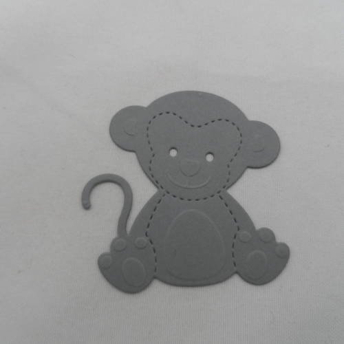 N°758 petit singe en  papier  gris  découpage et gaufrage 