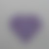 N°628 d'un  cœur rempli de petits cœurs évidés en papier violet découpage fin 
