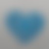 N°652 d'un grand cœur style "napperon"  en papier bleu turquoise découpage fin 
