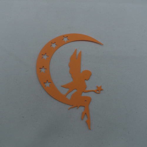 N°631 jolie fée  assisse sur un croissant de lune étoiles évidées en papier orange  découpage