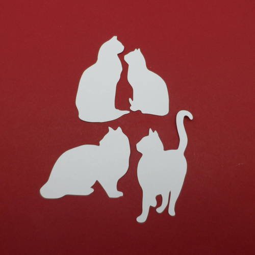 N°257 lot de quatre chats positions différentes  en papier blanc  découpage  fin 