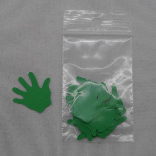 N°536 d'un lot de dix petites mains  en papier vert n°1 découpage fin 