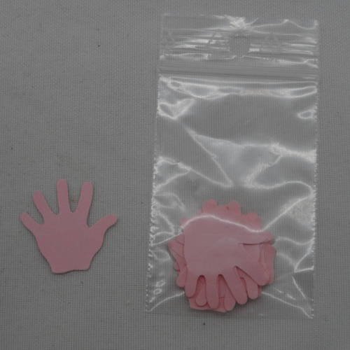 N°536  d'un lot de dix petites mains  en papier rose découpage fin 