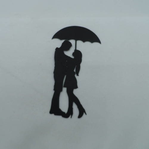 N°501  d'un couple sous un parapluie  en papier noir  découpage
