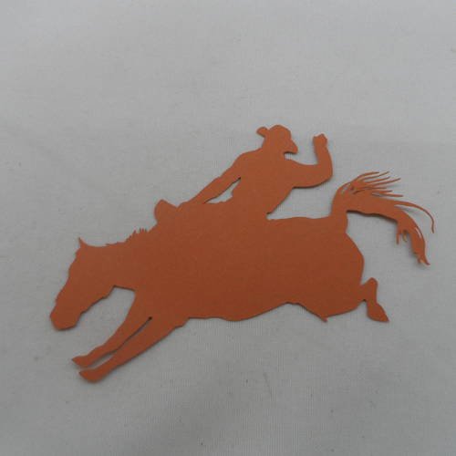 N°430  d'un rodéo  cow-boy et cheval en papier marron clair  découpage fin