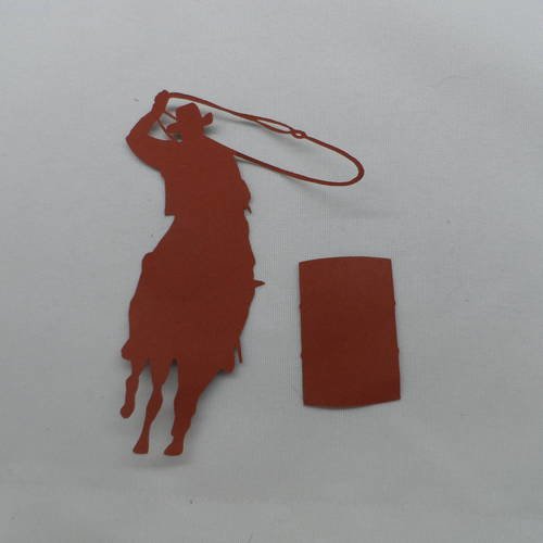 N°133  d'un cow boy avec son  lasso et une barrique  en papier marron  découpage