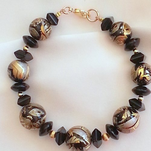 Bracelet en perles tensha et onyx,rondes de 12 et 10 mm de diamètre,longueur 19,5 cm,