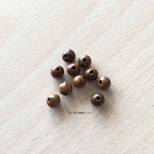 Perles en bois "ailes de poulet"  6 mm 