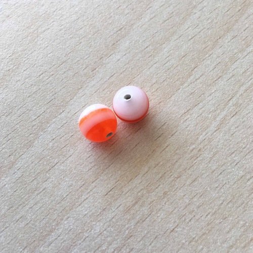 Perle artisanale en verre  "ronde " couleur: orange