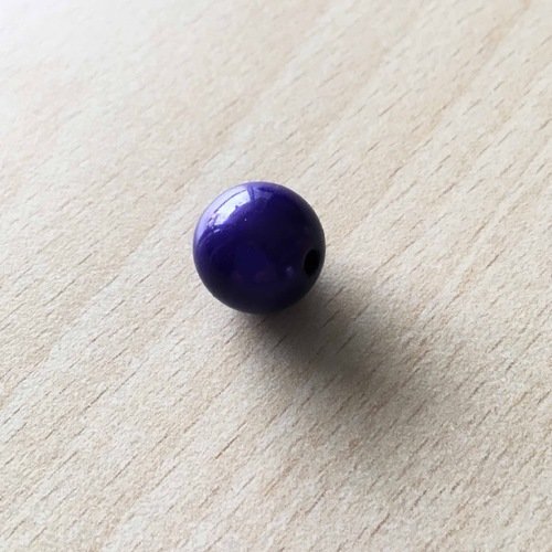 Jolie perle magique 14 mm  couleur  violet