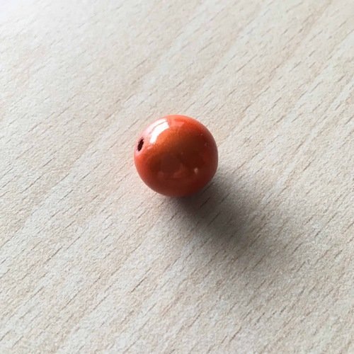 Jolie perle magique 14 mm  couleur  orange