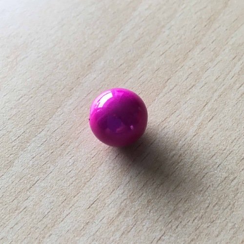 Jolie perle magique 14 mm  couleur  fuchsia