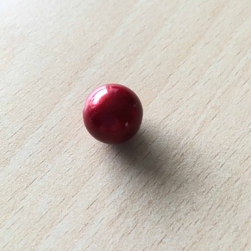 Jolie perle magique 14 mm  couleur  bordeaux