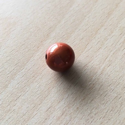 Jolie perle magique 14 mm  couleur  bronze